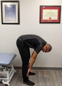 Relief for Low Back Pain McKenzie MDT Exercise - Flexion in Standing